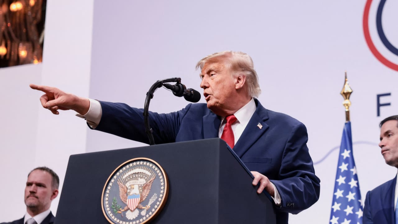 US President Donald Trump, with Commerce Secretary Howard Lutnick and Secretary of State Marco Rubio, holds a press conference during the G7 Summit in Evian-les-Bains, France, June 17, 2026.