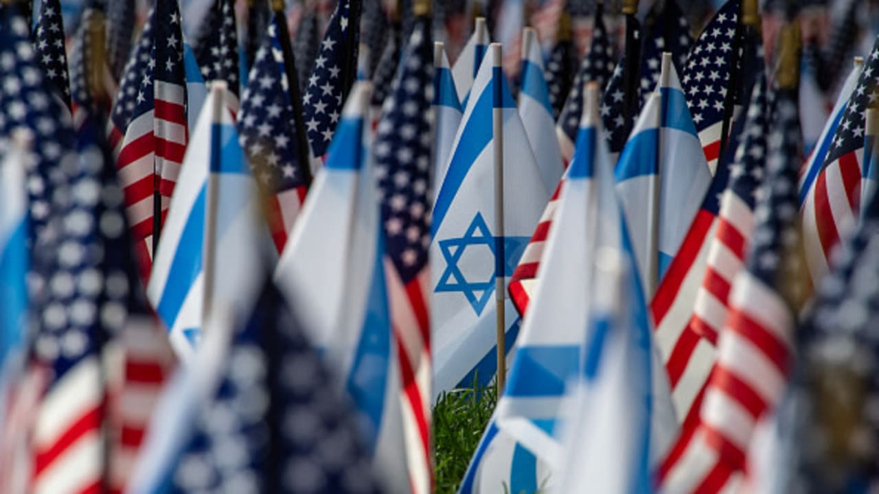 US and Israeli flags fill the field at Statler Park in Boston, Massachusetts, on October 18, 2023