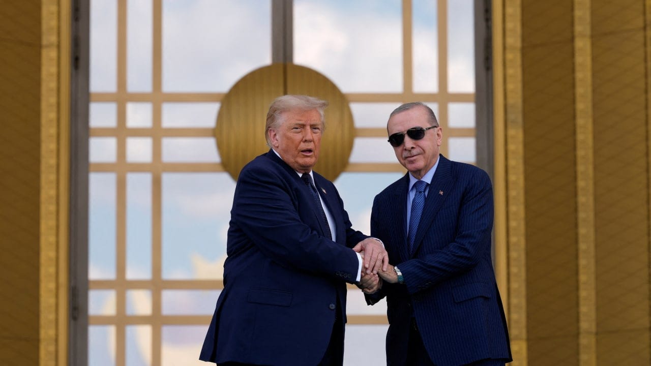 U.S. President Donald Trump shakes hands with Turkish President Recep Tayyip Erdogan as he arrives at the Bestepe Presidential Compound during a formal welcome for the NATO summit in Ankara, Turkey, Tuesday, July 7, 2026. 