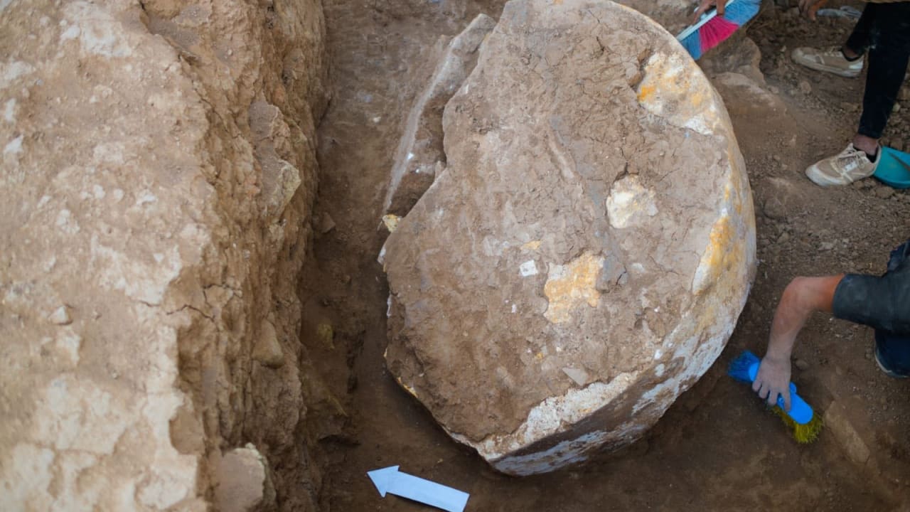 A fragment of an ancient stele dating to the reign of the Assyrian King Ashurbanipal found in Iraq's Nineveh province, July 17, 2026.