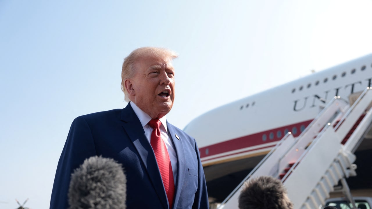US President Donald Trump speaks to the media as he departs for Dover, Delaware, to attend the dignified transfer of US Army service members killed in Jordan and Iraq, July 22, 2026