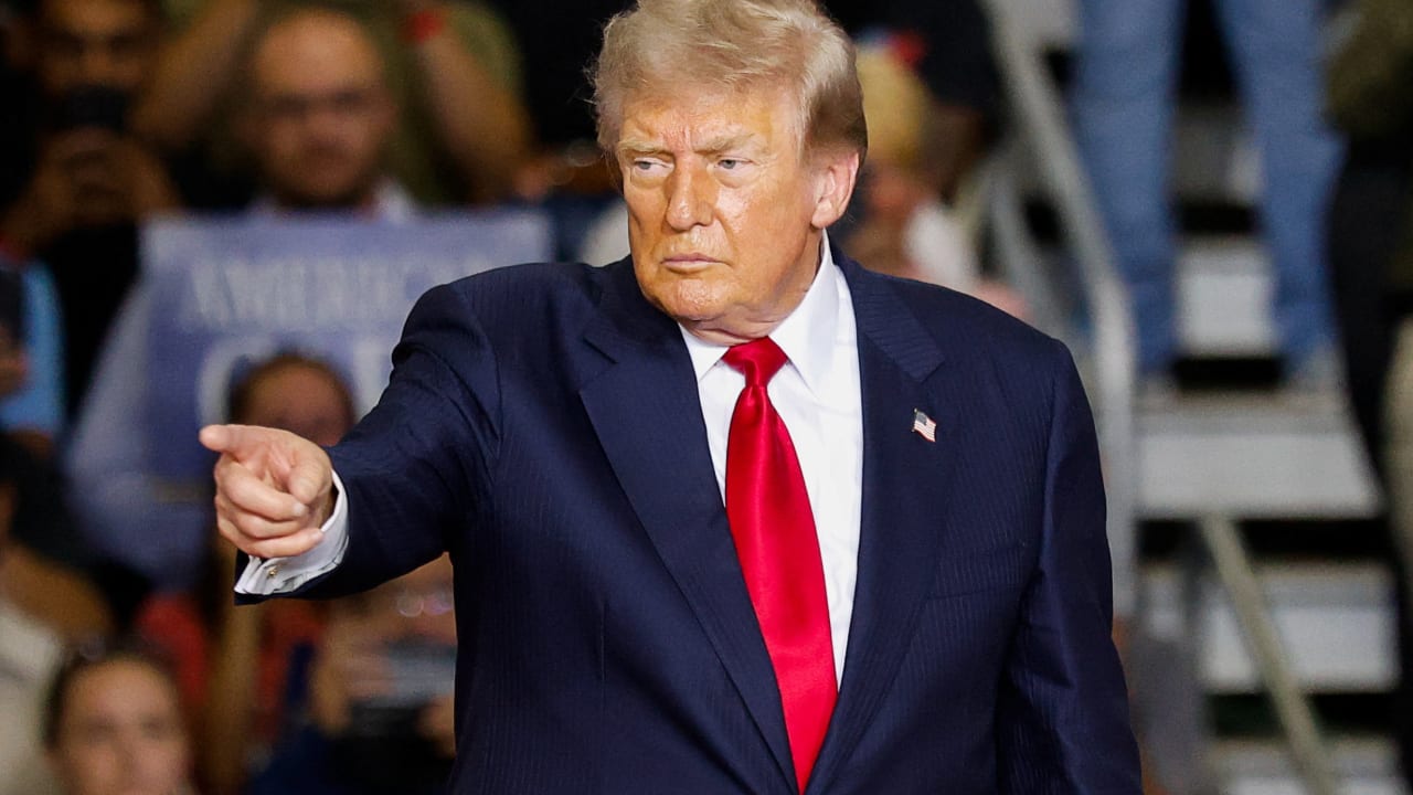 US President Donald Trump points, as he delivers remarks on the economy, at the General Motors Proving Ground in Milford, Michigan, US July 27, 2026.