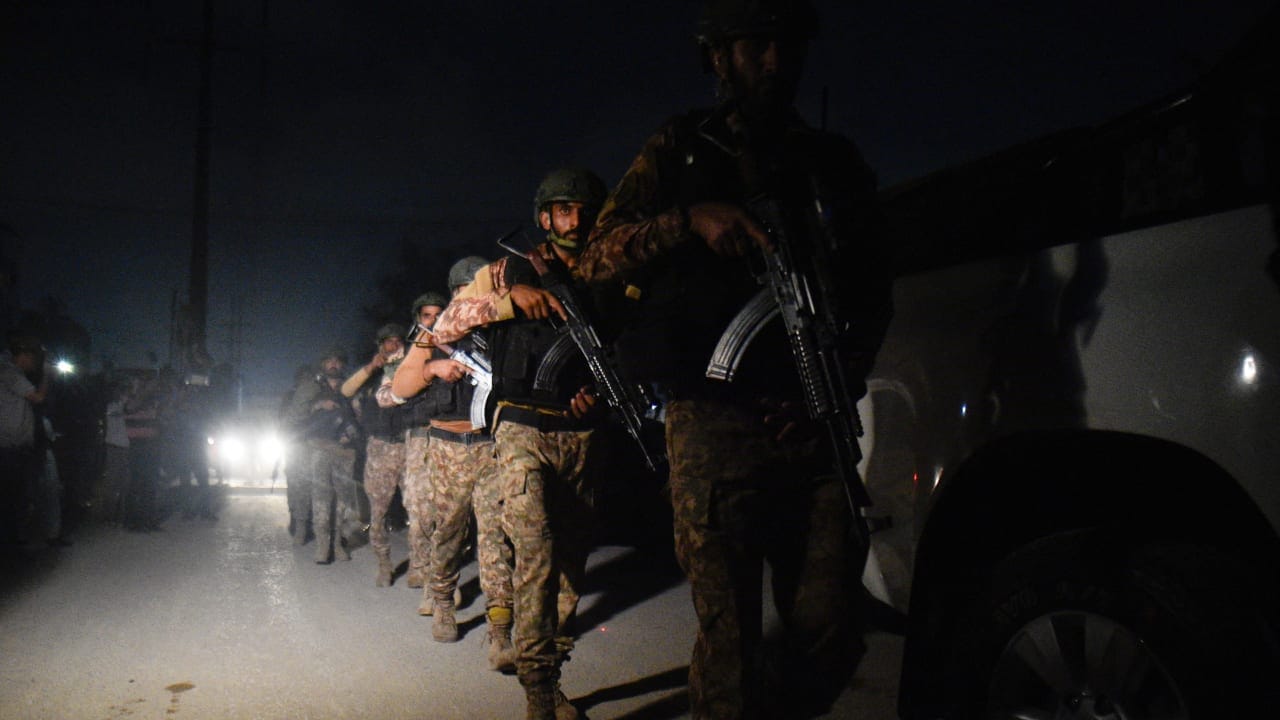 Security personnel patrols after an explosion and gunfire were reported, near offices of the Rangers, a paramilitary force, in Karachi, Pakistan, June 27, 2026. 