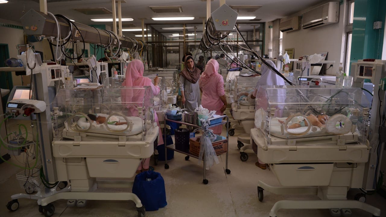 Pakistani nurses take care of newborn babies at the Neonatal intensive care unit of Pakistan Institute of Medical Sciences (PIMS) in Islamabad on February 20, 2018