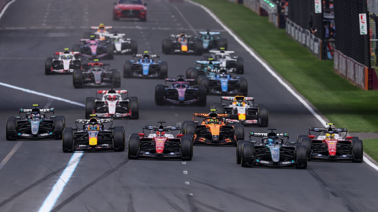 George Russell of Great Britain driving the (63) Mercedes AMG Petronas F1 Team W17 leads Charles Leclerc of Monaco driving the (16) Scuderia Ferrari SF-26 and the rest of the field at the start during the F1 Grand Prix of Australia at Albert Park Grand Prix Circuit on March 08, 2026 in Melbourne.