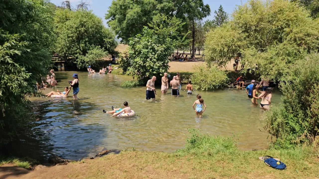 The Dan Stream flowing through Kibbutz Dafna.