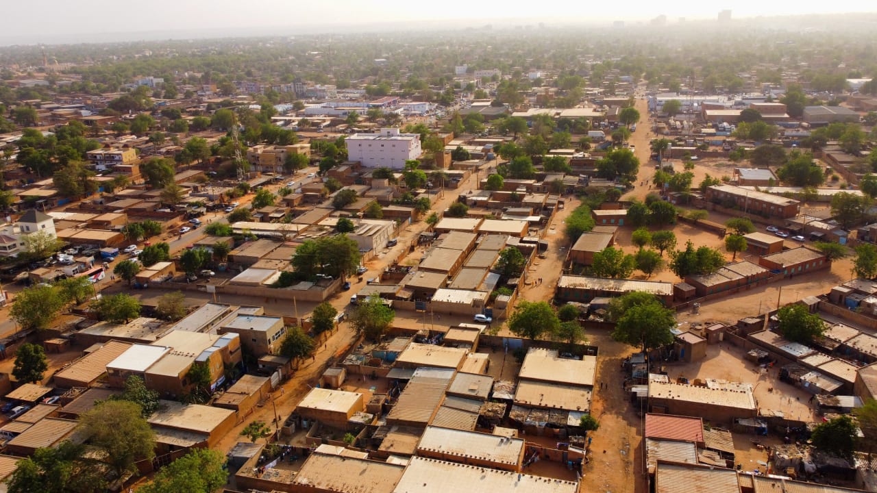 (Illustrative) A drone picture shows a suburb following the attack on the international airport in Niamey, Niger, on January 30, 2026.