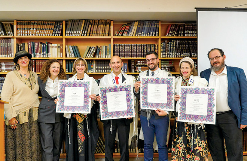  The Ordination Ceremony at the end of December 2021 at the Schechter Rabbinical Seminary in Jerusalem. (Left to right): Rabbi Mimi Feigelson, Rabbi Diana Villa, Rabbi Amirit Rosen, Rabbi Eitan Krul, Rabbi Danny Weininger, Rabbi Nava B. Meiersdorf and Rabbi Avi Novis-Deutch (photo credit: ITAI NADAV)