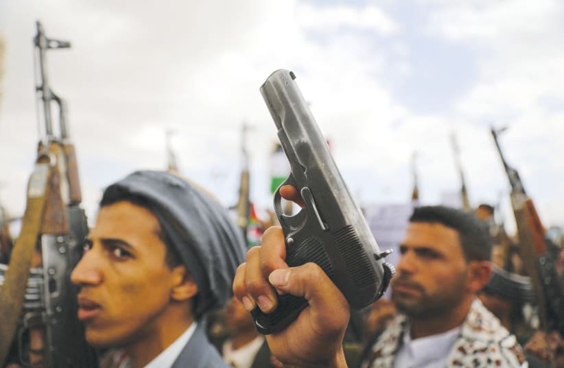  PROTESTERS, MAINLY Houthi supporters, rally to show support for the Palestinians in the Gaza Strip, in Sanaa, Yemen, this past Friday. (photo credit: KHALED ABDULLAH/REUTERS)