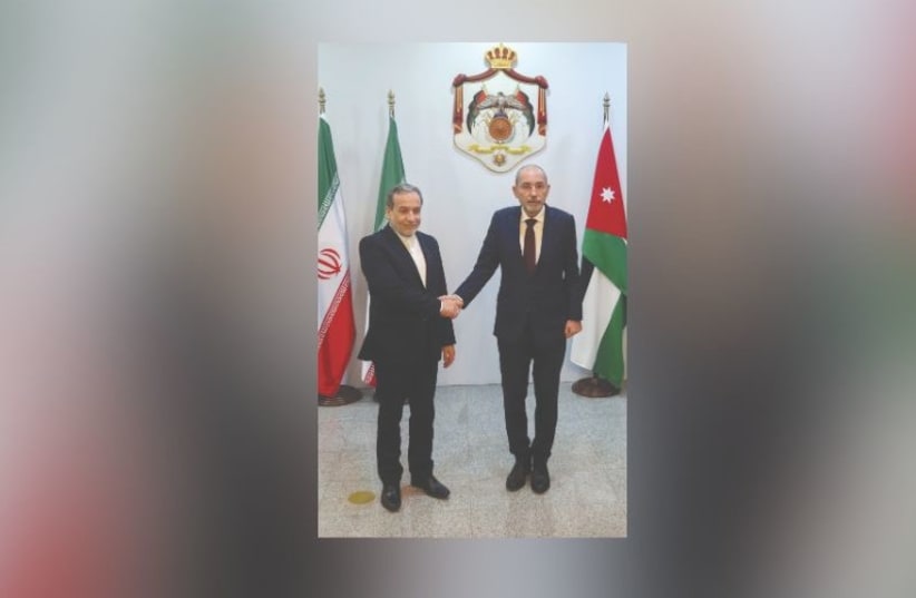  JORDAN’S FOREIGN MINISTER Ayman Safadi (right) meets with Iran’s Foreign Minister Abbas Araghchi in Amman, last week. What prevents the territorial continuity of the Iranian regime in the region is the Hashemite Kingdom of Jordan and the State of Israel, the writer stresses.  (photo credit: JEHAD SHELBAK/REUTERS)