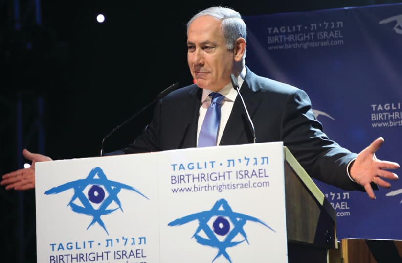  PRIME MINISTER Benjamin Netanyahu attends a Birthright event held at the International Convention Center in Jerusalem in 2011. ‘Strategically – and ideologically – I focus on Generation Birthright, not the Bibi-bashers,’ says the writer. (photo credit: Yossi Zamir/Flash 90)