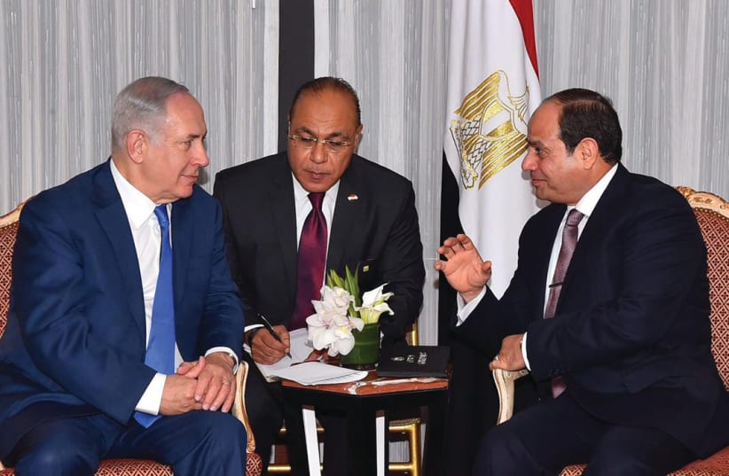  PRIME MINISTER Benjamin Netanyahu meets with Egyptian President Abdel Fattah al-Sisi ahead of the opening of the UN General Assembly in New York in 2017. A peace treaty that has been a pillar of regional stability for 45 years is suddenly being questioned, says the writer. (photo credit: Egyptian Presidency/Reuters)