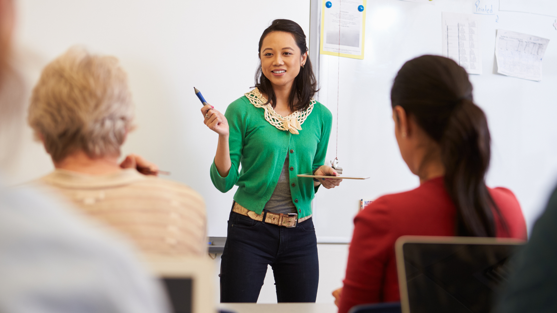 Teacher addressing class.