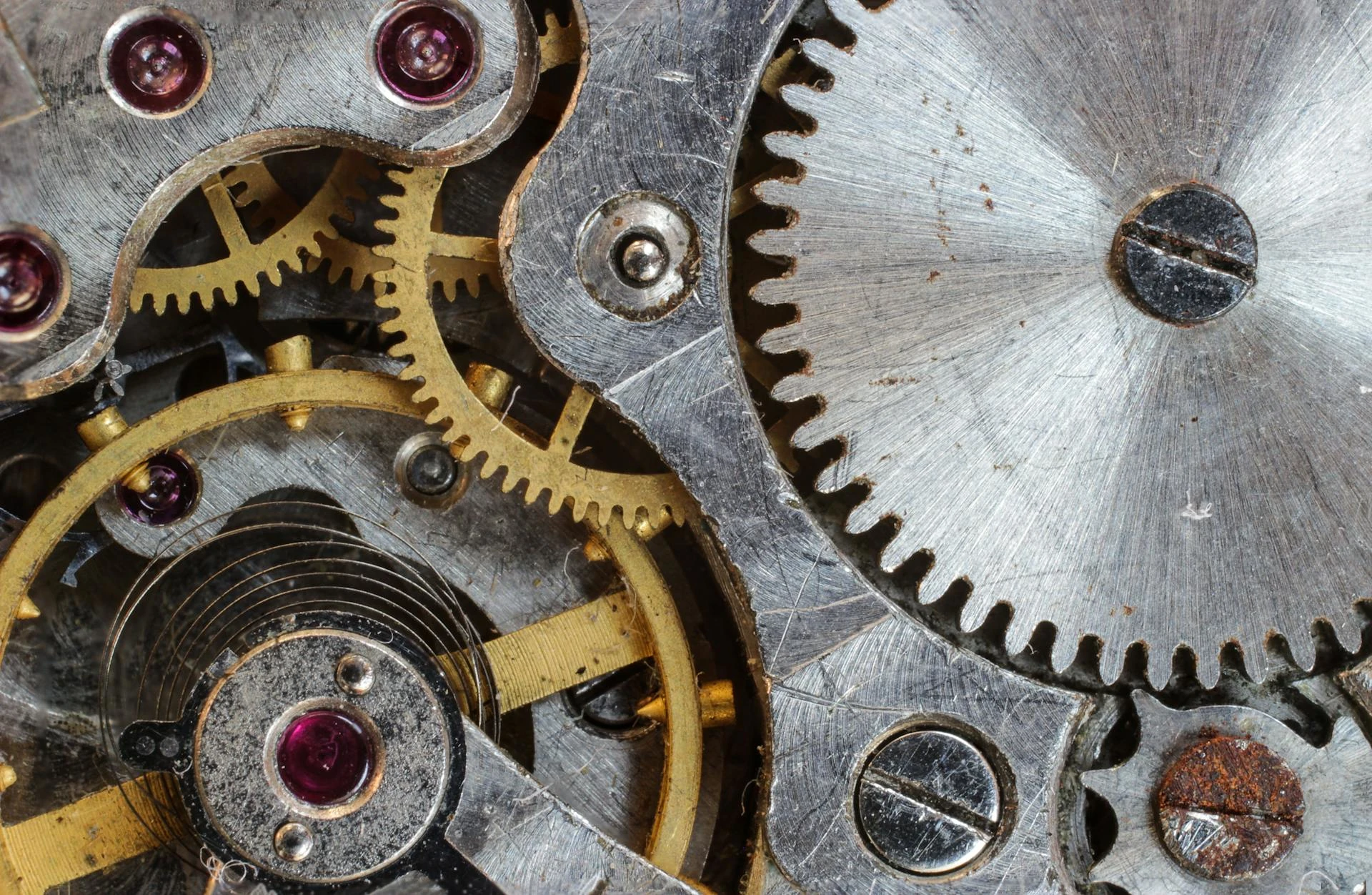 Grey and gold steel gears. Photo by Pixabay: https://www.pexels.com/photo/gray-and-gold-steel-gears-159275/ A selection of grey and gold interlocking steel gears, representing the the inner workings of Kodi.