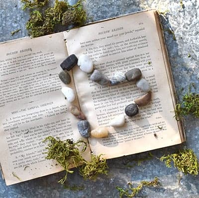 Rock heart and old book.