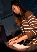 Student playing the piano