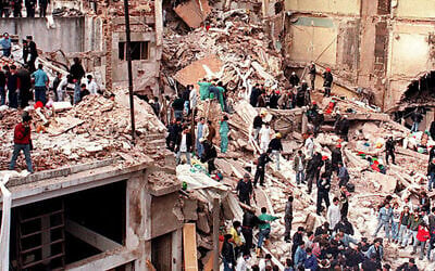 The aftermath of the bombing at the Argentinian Israelite Mutual Association (AMIA) in Buenos Aires, Argentina, July 18, 1994. (AFP) The aftermath of the bombing at the Argentinian Israelite Mutual Association (AMIA) in Buenos Aires, Argentina, July 18, 1994. (AFP)