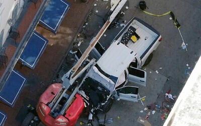 An Islamic State flag lies on the ground rolled up behind the pickup truck that Shamsud-Din Jabbar drove into a crowd on Bourbon Street in New Orleans on Jan. 1, 2025. (AP Photo/Gerald Herbert, File) An Islamic State flag lies on the ground rolled up behind the pickup truck that Shamsud-Din Jabbar drove into a crowd on Bourbon Street in New Orleans on Jan. 1, 2025. (AP Photo/Gerald Herbert, File)