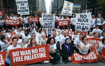 Chelsea Manning, bottom second left, Linda Sarsour, bottom second right, and protesters with Jewish Voice for Peace block traffic during a demonstration outside the New York office of US Senator Chuck Schumer, calling for an end to the US-Israel war with Iran, American support for Israel, and the Immigrations and Customs Enforcement agency on April 13, 2026, in New York. (AP Photo/Andres Kudacki) Chelsea Manning, bottom second left, Linda Sarsour, bottom second right, and protesters with Jewish Voice for Peace block traffic during a demonstration outside the New York office of US Senator Chuck Schumer, calling for an end to the US-Israel war with Iran, American support for Israel, and the Immigrations and Customs Enforcement agency on April 13, 2026, in New York. (AP Photo/Andres Kudacki)