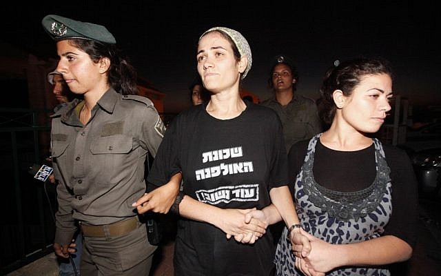 The Fattal family being forcibly evacuated from the Ulpana outpost in the West Bank settlement of Beit El (photo credit: Miriam Alster/Flash90) The Fattal family being forcibly evacuated from the Ulpana outpost in the West Bank settlement of Beit El (photo credit: Miriam Alster/Flash90)