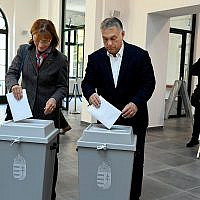Hungarian Prime Minister Viktor Orban of the governing Fidesz party and his wife cast their ballots during local elections in Budapest, Hungary, October 13, 2019. (Szilard Koszticsak/MTI via AP)
