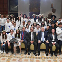 Israeli President Reuven Rivlin hosts 60 tweens and teenagers previously injured in terror attacks for a celebration of their bar and bat mitzvahs in Jerusalem on Thursday December 19, 2019. 
(Kobi Gideon / GPO)