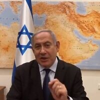 Prime Minister Benjamin Netanyahu seen in a video produced on December 22, 2019, by his office in which he criticizes the High Court of Justice for considering a petition to declare him ineligible to run for re-election over pending corruption indictments. (Twitter screen capture)