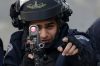 Palestinians clash with Israeli troops during in the West Bank city of Hebron, February 9, 2018. (Wisam Hashlamoun/Flash90)