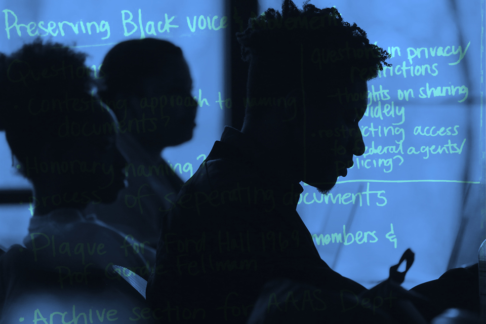 Silhouette of Black students against a blue background