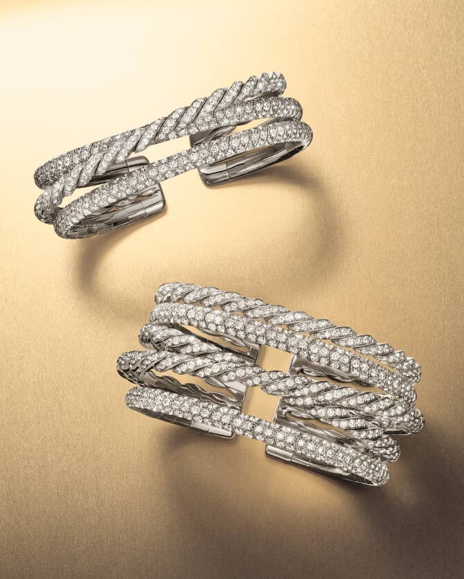 Two David Yurman Sculpted Cable bracelets.