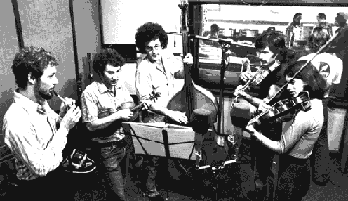 THE KLEZMORIM broadcasting live at KPFA, Berkeley, 1976. L to R: Lev Liberman, David Julian Gray, Greg Carageorge, David Skuse, Laurie Chastain. [Photo: Dennis Galloway. All rights reserved.]
