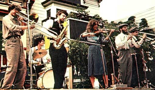 THE KLEZMORIM, San Francisco, 1978. L to R: Rick Elmore, John Raskin, Lev Liberman, Miriam Dvorin, David Julian Gray, Brian Wishnefsky. Not pictured: Suzy Rothfield. [Photo: Chris Strachwitz]